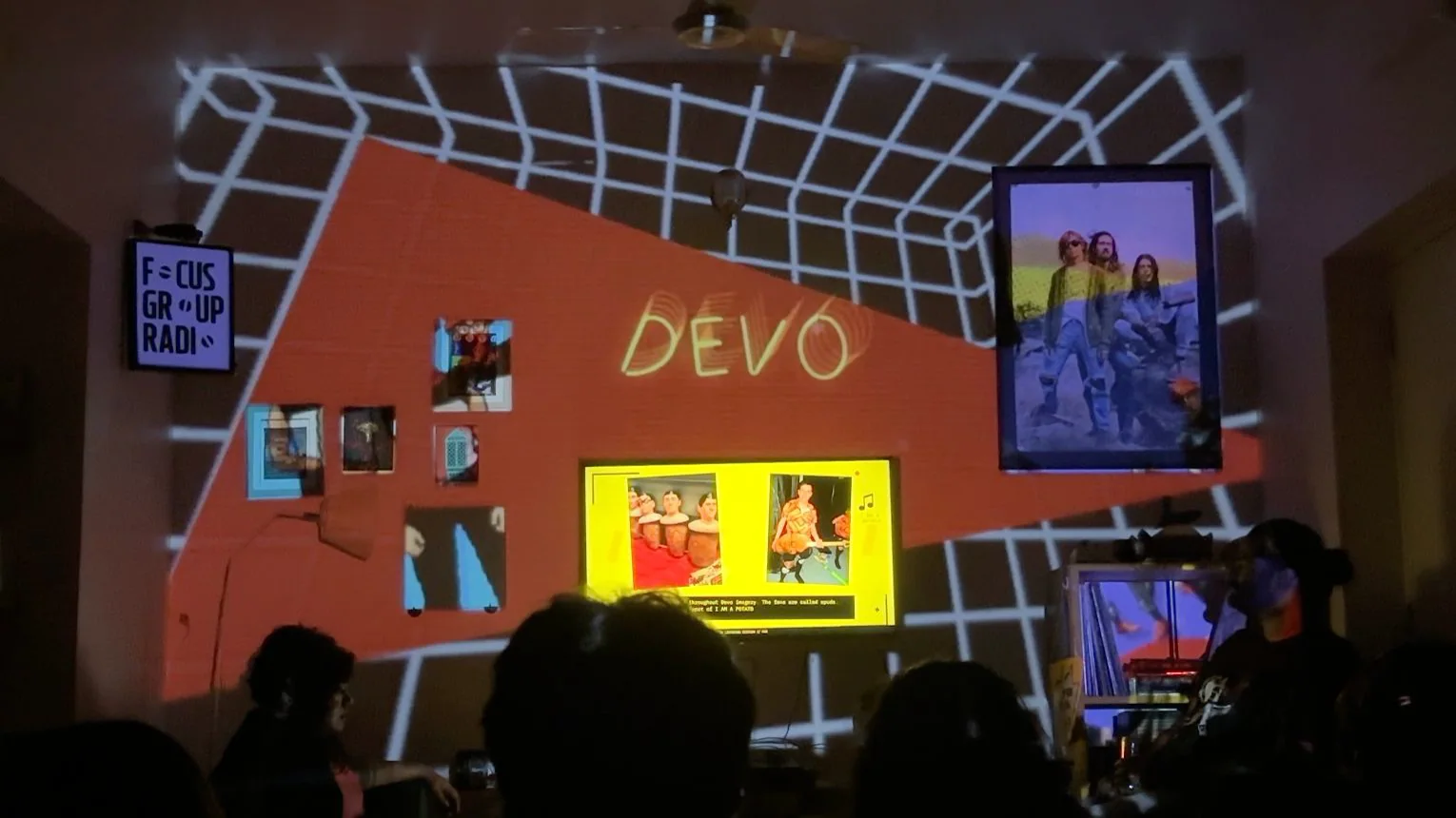 DEVO imagery and projection mapping filling the listening room.